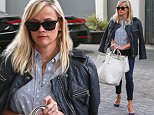 Picture Shows: Reese Witherspoon  April 07, 2015\n \n 'Wild' actress Reese Witherspoon is seen leaving her office in Beverly Hills, California. Reese dressed casually in a print blouse, blue skinny jeans and a black leather jacket over her shoulders.\n \n Non-Exclusive\n UK RIGHTS ONLY\n \n Pictures by : FameFlynet UK © 2015\n Tel : +44 (0)20 3551 5049\n Email : info@fameflynet.uk.com