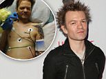 HOLLYWOOD, CA - NOVEMBER 20:  Musician Deryck Whibley arrives at Lucky Strike and Playboy's "Bowling With Bunnies" event benefiting Los Angeles Regional Food Bank at Lucky Strike Bowling Alley on November 20, 2014 in Hollywood, California.  (Photo by Chelsea Lauren/WireImage)