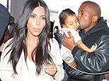 Kim Kardashian, Kanye and a sleepy baby Nori arrive at LAX to head to Armenia and then to Israel with the entire family.  Wearing jeans and a long white coat that looks like a bathrobe, Kim was barraged with questions about brother Rob who is believed to be dangerously depressed and perhaps suicidal. Kanye  just settled with Daniel Ramos regarding the assault accusation stemming from an incident in July 2013. They even shaked hands after. April 7, 2015 X17online.com