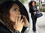 EXCLUSIVE: Actress Salma Hayek enjoys a cigarette and chats on her cellphone while she is driven around town and runs errands in West Hollywood, Ca\n\nPictured: Salma Hayek\nRef: SPL993960  070415   EXCLUSIVE\nPicture by: GoldenEye /London Entertainment\n\nSplash News and Pictures\nLos Angeles: 310-821-2666\nNew York: 212-619-2666\nLondon: 870-934-2666\nphotodesk@splashnews.com\n