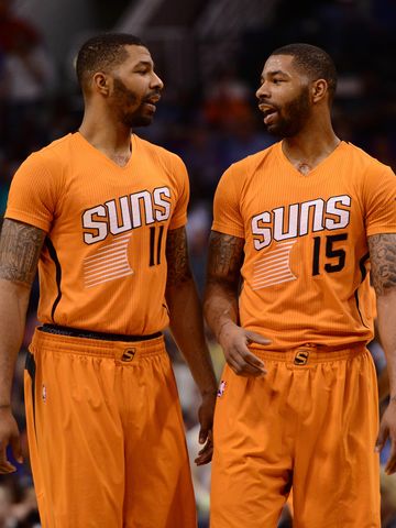 Markieff (11) and Marcus Morris (15) are accused of