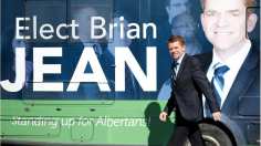 The Wildrose can't afford a bus this time and has downsized to a recreational vehicle — one with a paint job featuring Leader Brian Jean and the slogan "Standing Up for Albertans."