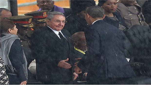 The Castro brothers have never before been invited to attend the Summit of the Americas [AP]