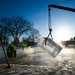 City workers cutting lake ice in Winona, Minn., last month. February’s job gains exceeded economists’ expectations.